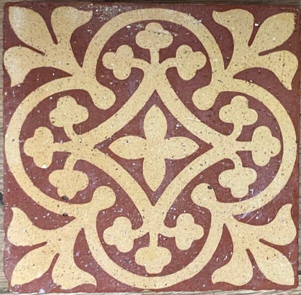 Goodwin Encaustic "quarry"  tile red with yellow incorporating a cardinal foliate cross