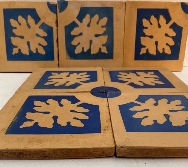 Group of 4 tiles with three spare depicting cream tree on blue background 6"